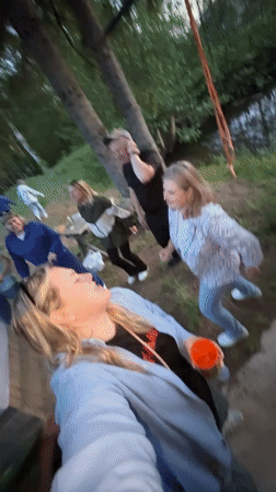 Group enjoys outdoor picnic with dancing near Markovo water