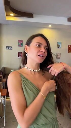 Woman shops at ice cream cafe in Thai beach town