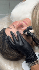 Woman receives permanent eyeliner tattoo at Omsk cosmetic clinic