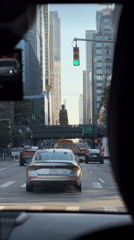 Driver captures typical NYC street scene through windshield