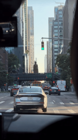 Driver captures typical NYC street scene through windshield