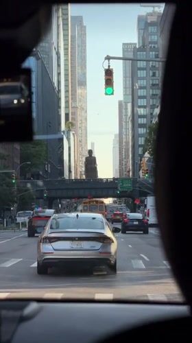 Driver captures typical NYC street scene through windshield