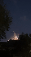 Evening scenes and fireworks in Blagoveshchensk with illuminated bridge