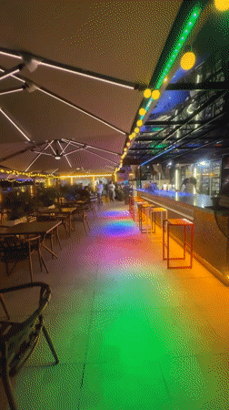 Sea Rock Coffee glows at night on the Qinhuangdao waterfront