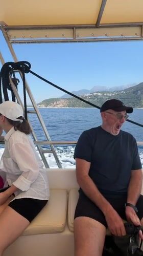 Boat tour cruising along the Montenegrin coast near Budva