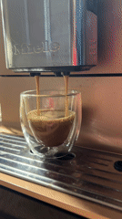 Morning espresso brewing captured on Miele machine in Plovdiv