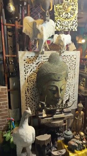 Art shop with Buddha artifacts documented in Choeng Mon