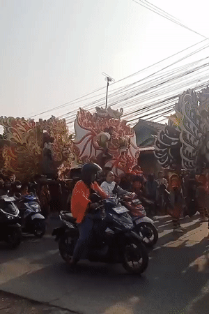 Ornate cultural parade floats move through Karawang streets