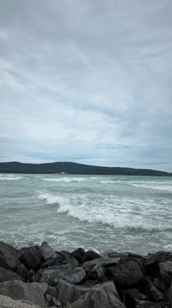 Tourists view painted rock art along Bulgaria's Black Sea coast