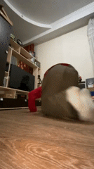 Young man breakdances, snacks in Krasnoyarsk apartment