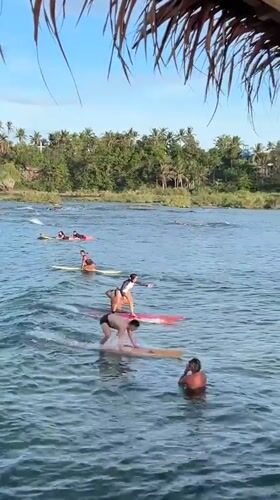 Morning surf session draws crowds to General Luna waters