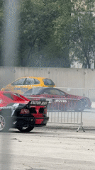 Cars perform burnouts at motorsport demonstration in Plovdiv, Bulgaria