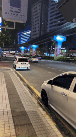 Evening street life documented across central Kuala Lumpur districts
