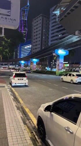 Evening street life documented across central Kuala Lumpur districts