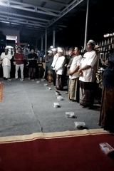 Evening Islamic gathering with communal meal in Pembataan, Indonesia