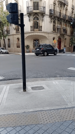 Man climbs into recycling dumpster in Buenos Aires