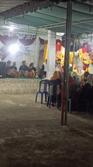 Outdoor wedding ceremony with live music in Taliwang, Indonesia