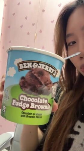 Woman captures casual moments with ice cream in Shapingba District