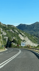 Mountain road documented in Montenegro on sunny morning
