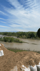 Muddy river with reinforced banks observed in Georgia