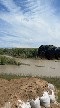 Muddy river with reinforced banks observed in Georgia