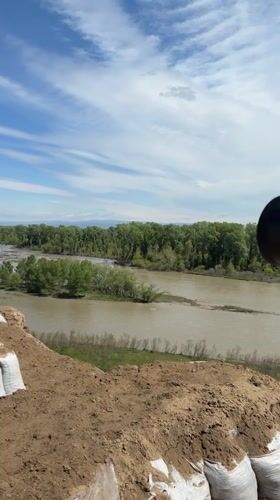 Muddy river with reinforced banks observed in Georgia