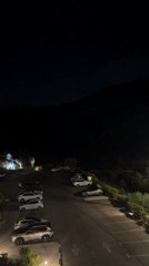 Nighttime parking lot scene in Tirat Karmel, Israel