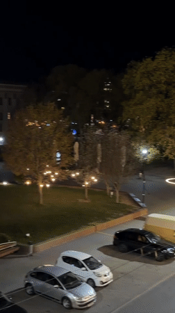 Couple celebrates with rings amid Hrodna's nighttime cityscape