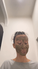 Woman documents green face mask skincare routine in Vietnam