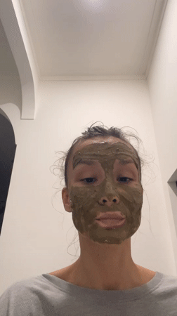 Woman documents green face mask skincare routine in Vietnam