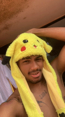 Young man in Pikachu hat documented in Porlamar, Venezuela