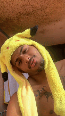Young man in Pikachu hat documented in Porlamar, Venezuela