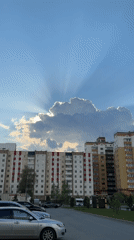 Dramatic sunburst clouds captured over Tobolsk residential district
