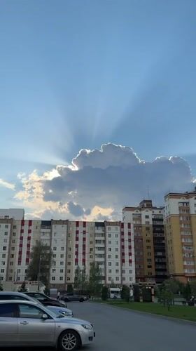 Dramatic sunburst clouds captured over Tobolsk residential district