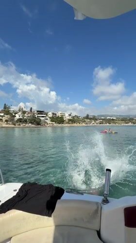 Man performs backflip from motorboat into Cyprus waters