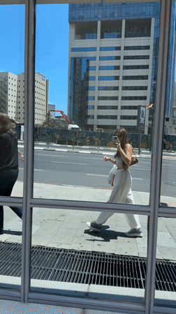 Street corner selfie moment in Ramat Gan