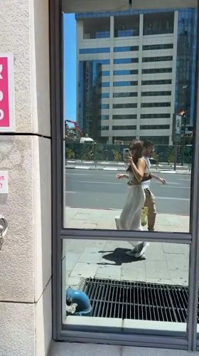 Street corner selfie moment in Ramat Gan