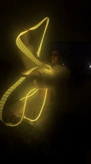 Late-night light ribbon dance performance captured in Mexico City