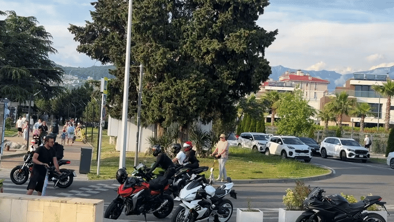 Motorcycles and scooters gather in Sirius, Russia outdoor area