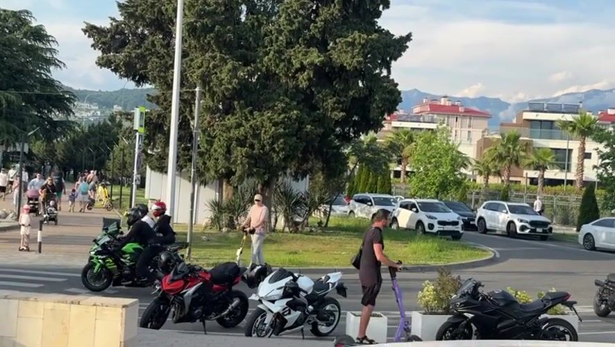 Motorcycles and scooters gather in Sirius, Russia outdoor area