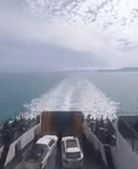 Ferry passenger documents ocean journey near Ko Samui, Thailand