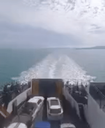 Ferry passenger documents ocean journey near Ko Samui, Thailand