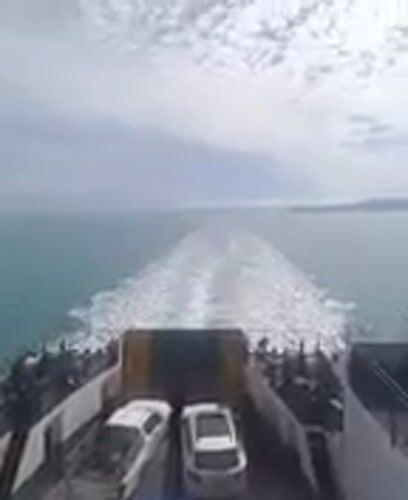 Ferry passenger documents ocean journey near Ko Samui, Thailand