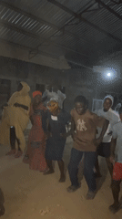 Evening dance gathering in a rustic Gudi, Nigeria venue