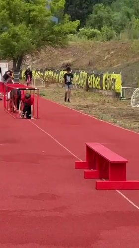 Children train on athletic track in Kazanlak, Bulgaria