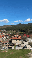 Village in valley documented by unknown witness