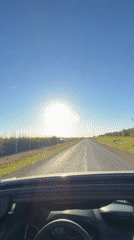 Convertible drive captured on sunny day in El Fouarate