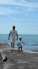 Sunny morning beach life captured along Sochi's Black Sea coast