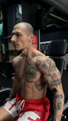 Tattooed man works out at Pleven gym Friday morning