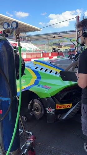 Race day pit lane activity at Mugello Circuit